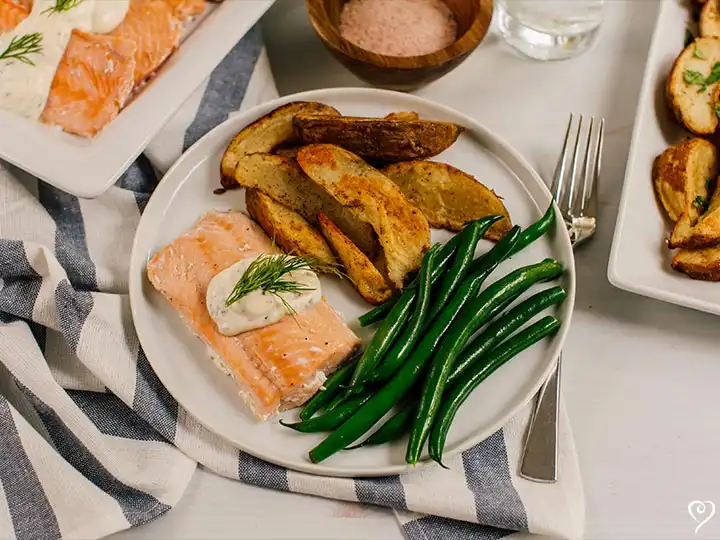 Salmon with Creamy Tarragon Sauce over Crispy Potatoes